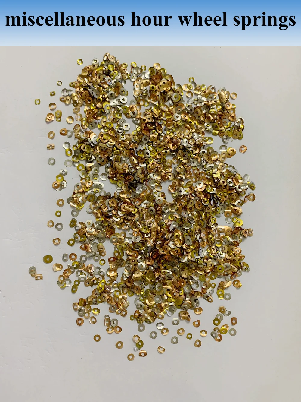 

Аксессуары для часовых механизмов различных размеров, различные часовые колеса, пружины, запасные части для часов