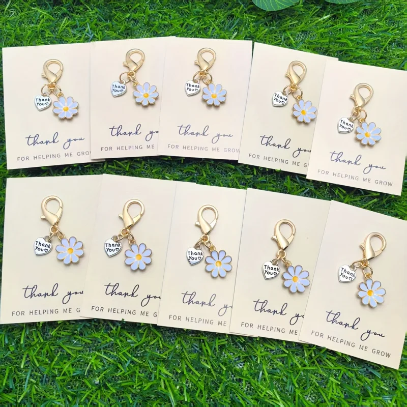 10Elegant and charming heart-shaped and floral keychain set，Comes with an inspirational card - Contains unique daisies、Freesia、T