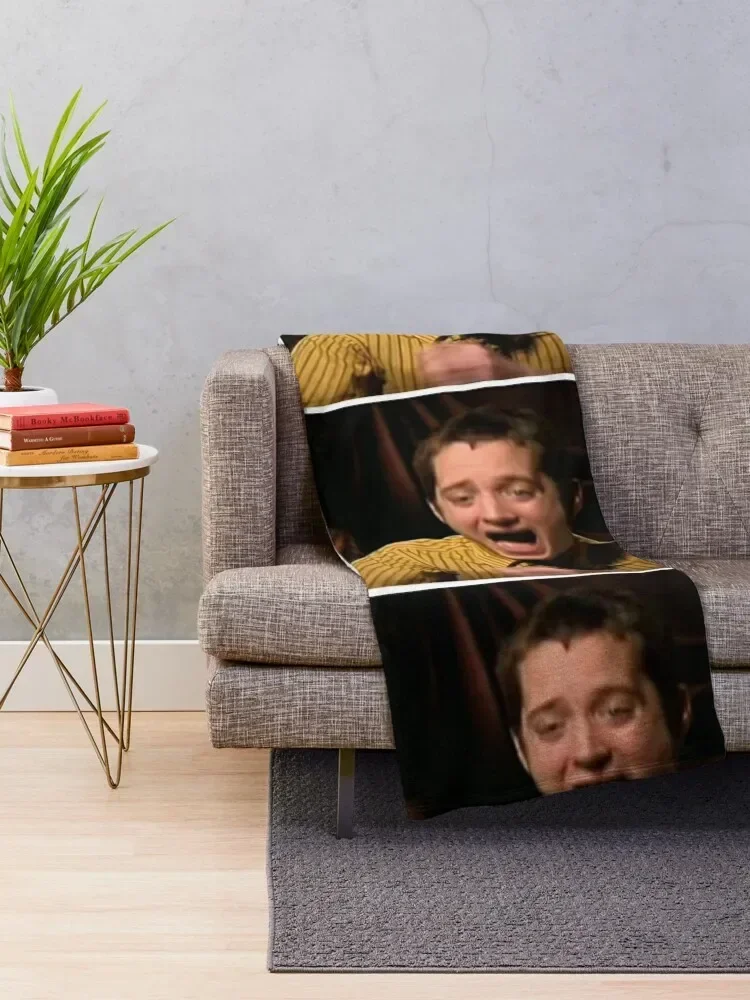 elijah wood laughing Throw Blanket