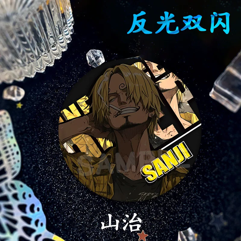 قطعة واحدة شارة أنيمي القرد D لوفي رورونوا زورو عاكسة ملونة ليزر فلاش مزدوج سانجي ترافالغار D قانون المياه شعار معدني