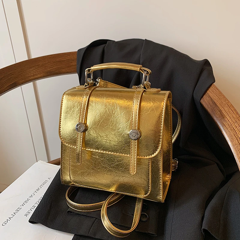 Sac à dos en PU brillant pour femme, sac à dos à loquet solide, fouet polyvalent, sac à dos de luxe, mode simple, haute qualité, nouveau style de créateur, 2024