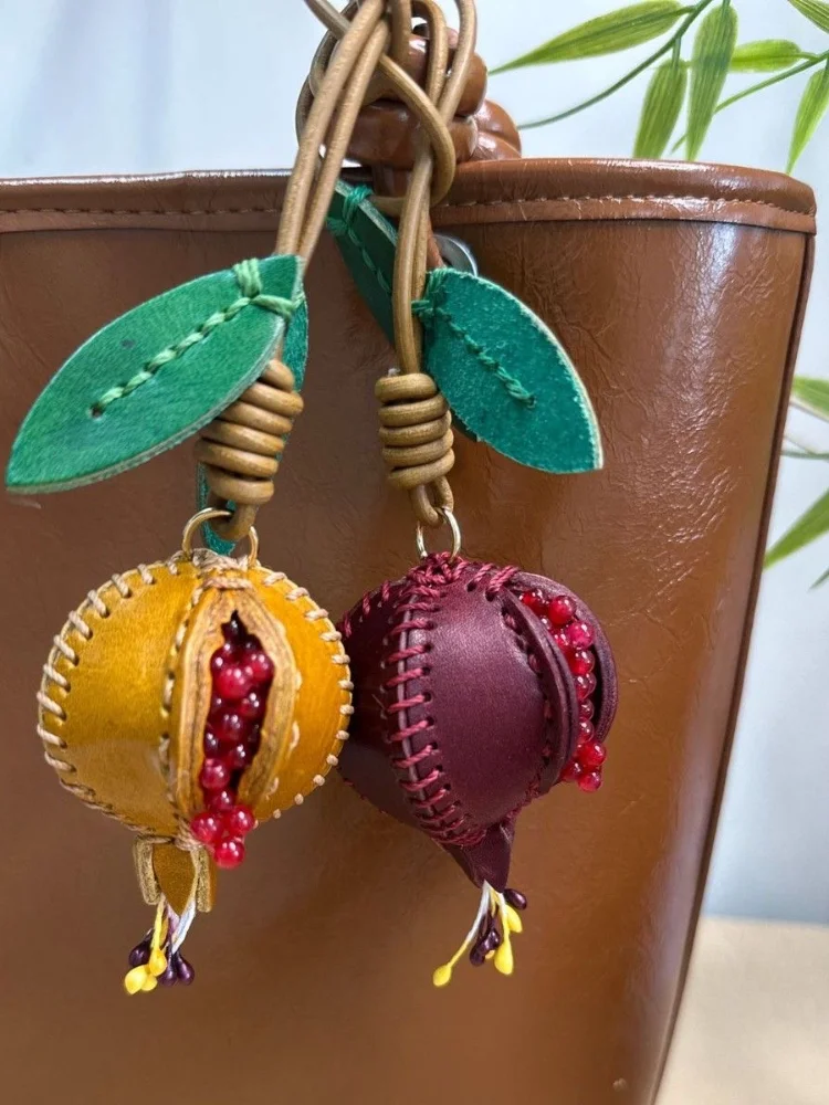 

Кожаный кулон в виде граната из коровьей кожи, креативный, ручной работы, модный, изящный, для сумок, милый, персонализированный аксессуар для сумок