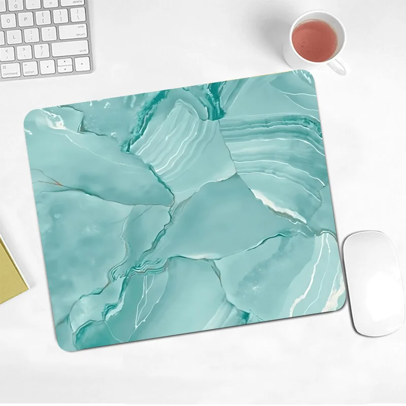 

The green marble-textured mouse pad with an anti-slip rubber base is of high quality and suitable for both office and home use