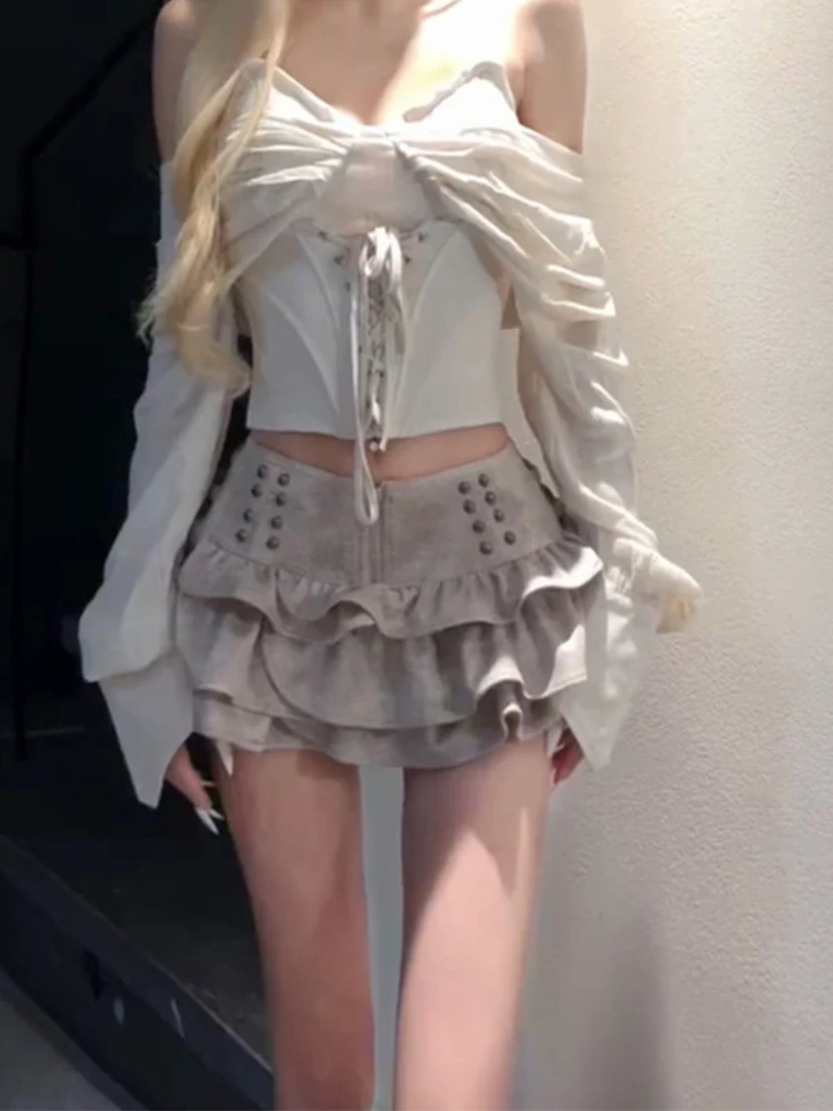 الموضة الفرنسية Y2K خمر الجلد المدبوغ رصع تنورة صغيرة المرأة الخريف الشتاء الرجعية الجرونج نفخة كعكة تنورة تصميم تحسس تنورة قصيرة #2