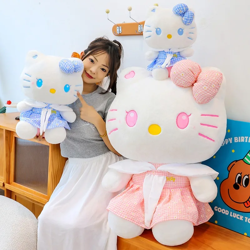 Sanrio Kawaii muñeco relleno de juguete lindo gato Hello Kitty en verano falda a cuadros niños regalo de cumpleaños niñas muñecas de peluche al por mayor