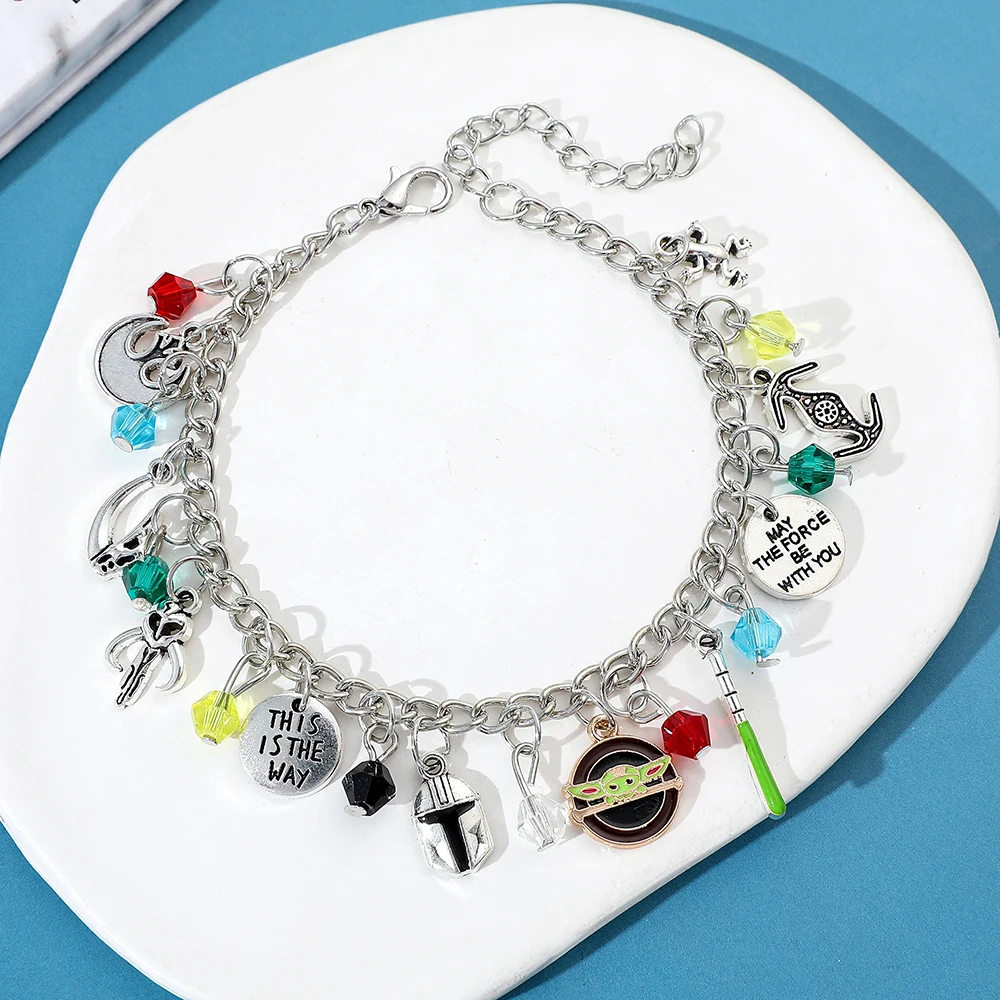 Star Wars Fan Jewelry the Mandalorian Inspired Charm Bracelet with Grogu Mythosaur Skull And Lightsaber Details Sci-Fi Accessory - view 3