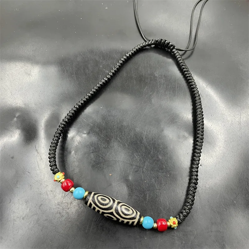 Six-Eyed Dzi Agate …