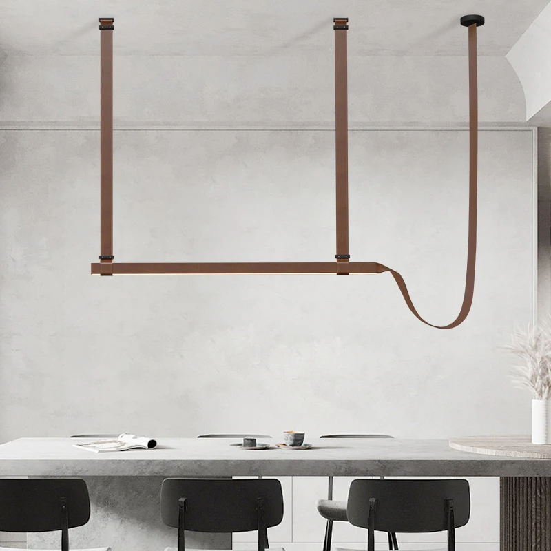 

Light luxury modern led brown black long leather belt pendant light for living room ceiling hanging decorative light fixtures.