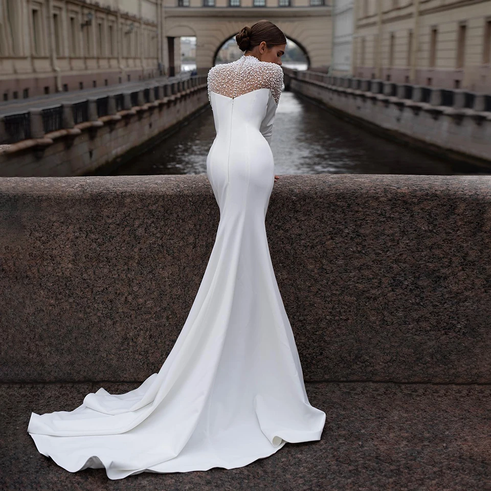 Luxury High Neck Shiny Pearls Beading Mermaid Wedding Dresses 2026 Saudi Arabic Long Sleeves Women Bridal Gowns Vestido De Noiva
