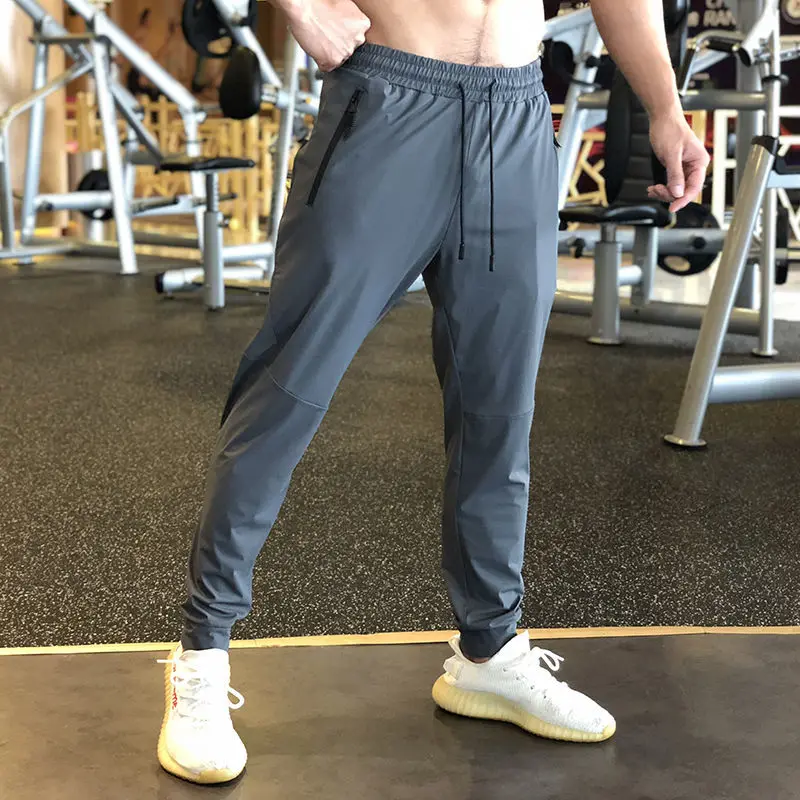 

Sports Pants Men's Summer Thin Section Loose Casual Running Closed Foot Pants Breathable Training Pants Fitness Quick Dry Pants