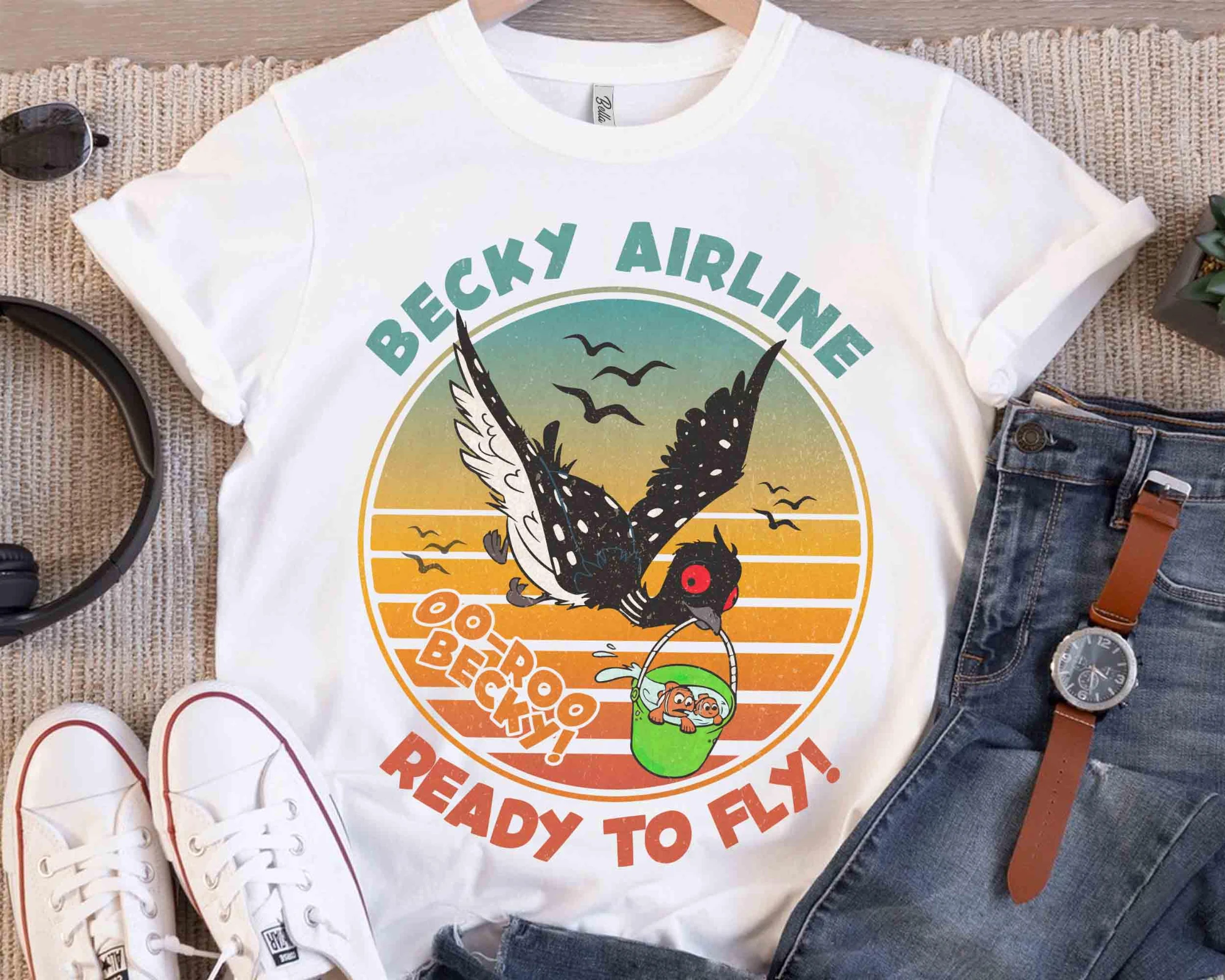 أين العثور على دوري الرجعية؟ تي شيرت Becky Aviation Is Preparing Flight، وقمصان Disney Pixar Nemo وMarlin المرحة