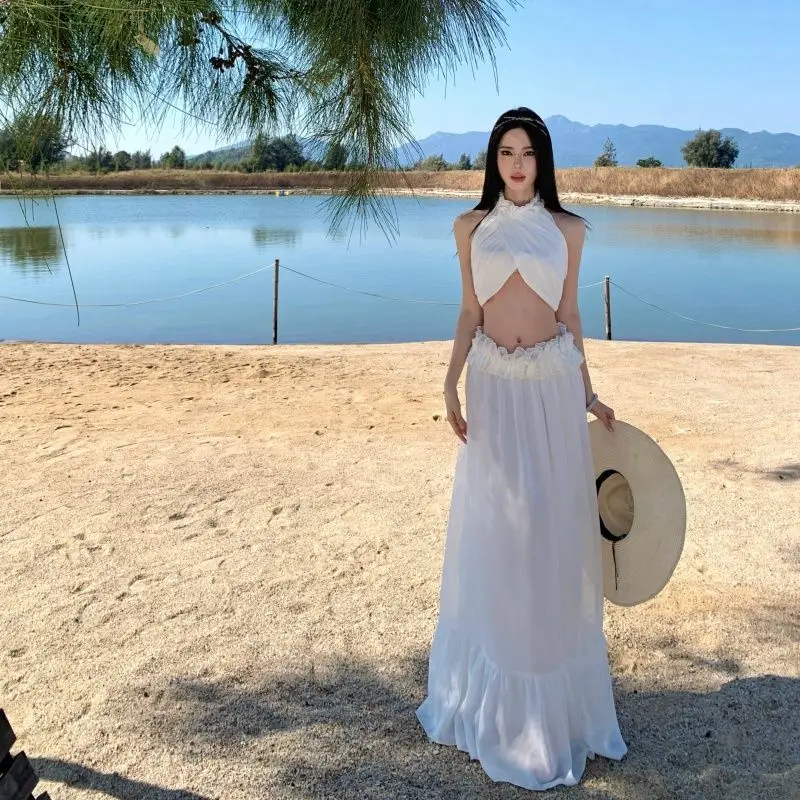 

Летний женский комплект из двух предметов в стиле кэжуал: новый, элегантный, с оригинальным дизайном, сексуальный топ с перекрестной горловиной и длинная юбка с кружевом и оборками.