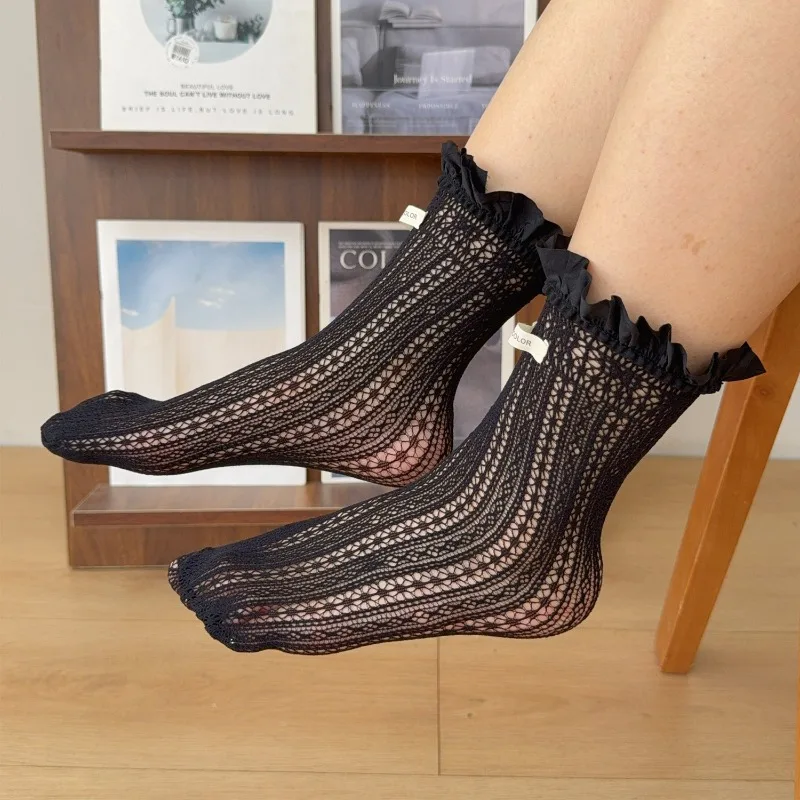 1-2Pairs JK جوارب بيضاء للنساء لوليتا نمط الدانتيل تقليم منتصف العجل جوارب تنفس الصيف رقيقة تكويم المدرسة الجوارب الطويلة