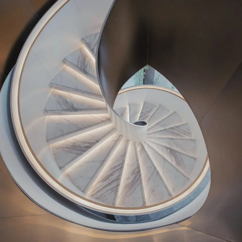 custom.Modern Factory Price Curved Tempered Glass Railing Staircase Marble Stairs