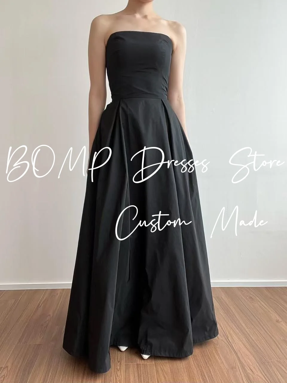 ชุดแต่งงานเรียบง่ายสีดำแบบเปิดไหล่ยาวกรอมพื้นผ้าทาฟต้าสไตล์เกาหลีสำหรับถ่ายภาพ ชุดราตรีเจ้าสาวสั่งตัดได้