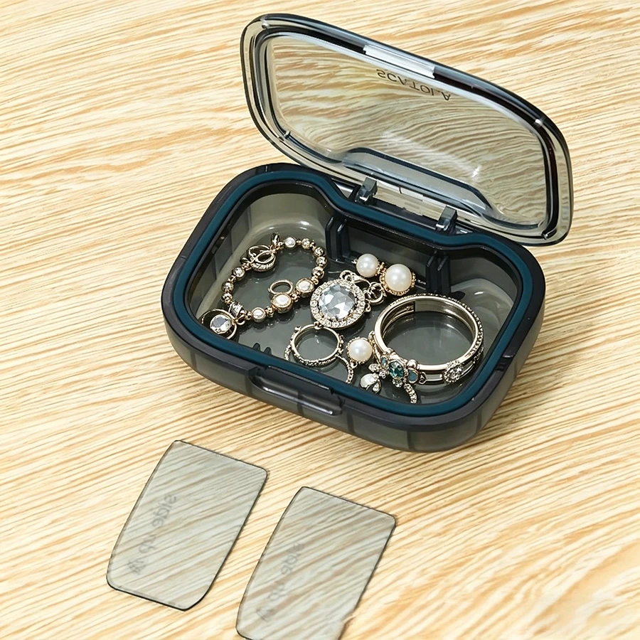 

Mini Portable Jewelry Box with Dust-Proof and Moisture-Proof Sealing Silicone Storage Compartment for Separating and Organizing
