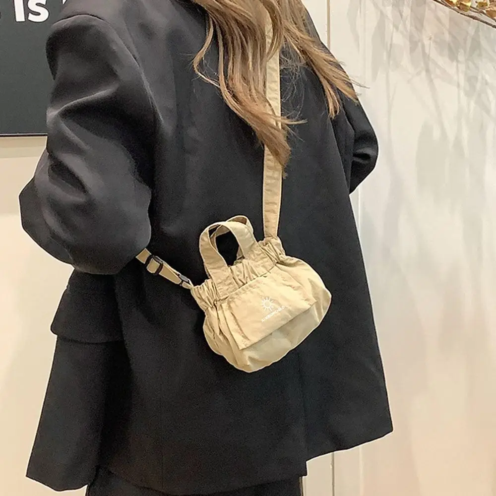 

Sweet Korean Style Nylon Shoulder Bag Crossbody Bag Small Canvas Messenger Bag Bucket Bag Solid Color Dumpling Bag Girls