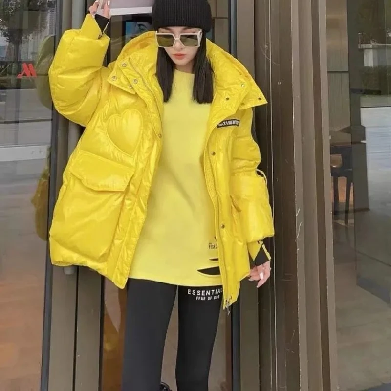 Nueva versión coreana de invierno, chaqueta de plumón brillante para mujer, chaqueta de plumón de pato blanco pequeña con capucha, color amarillo, personalidad Simple