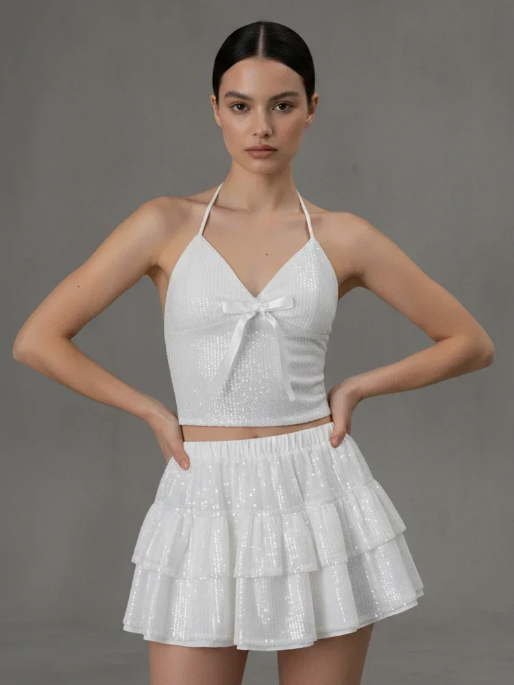 

Розовый многослойный комплект: мини-юбка А-силуэта и сексуальный топ без рукавов с открытыми плечами и V-образным вырезом, на бретельках, 2026. Женский комплект для отпуска и пляжа.