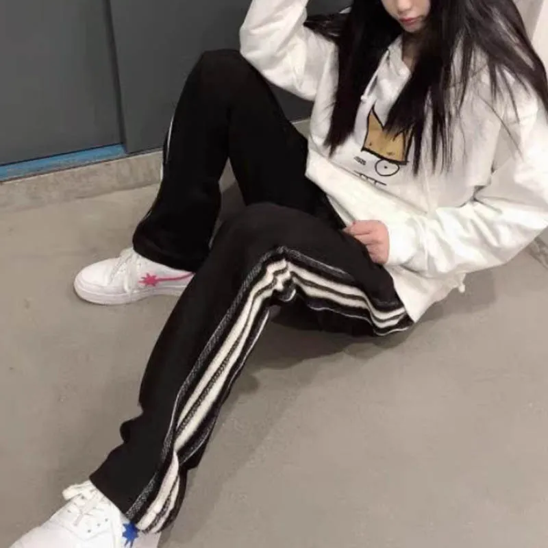 

Large size side splicing striped sports pants women's spring and autumn loose fashion couple straight leg wide leg pants
