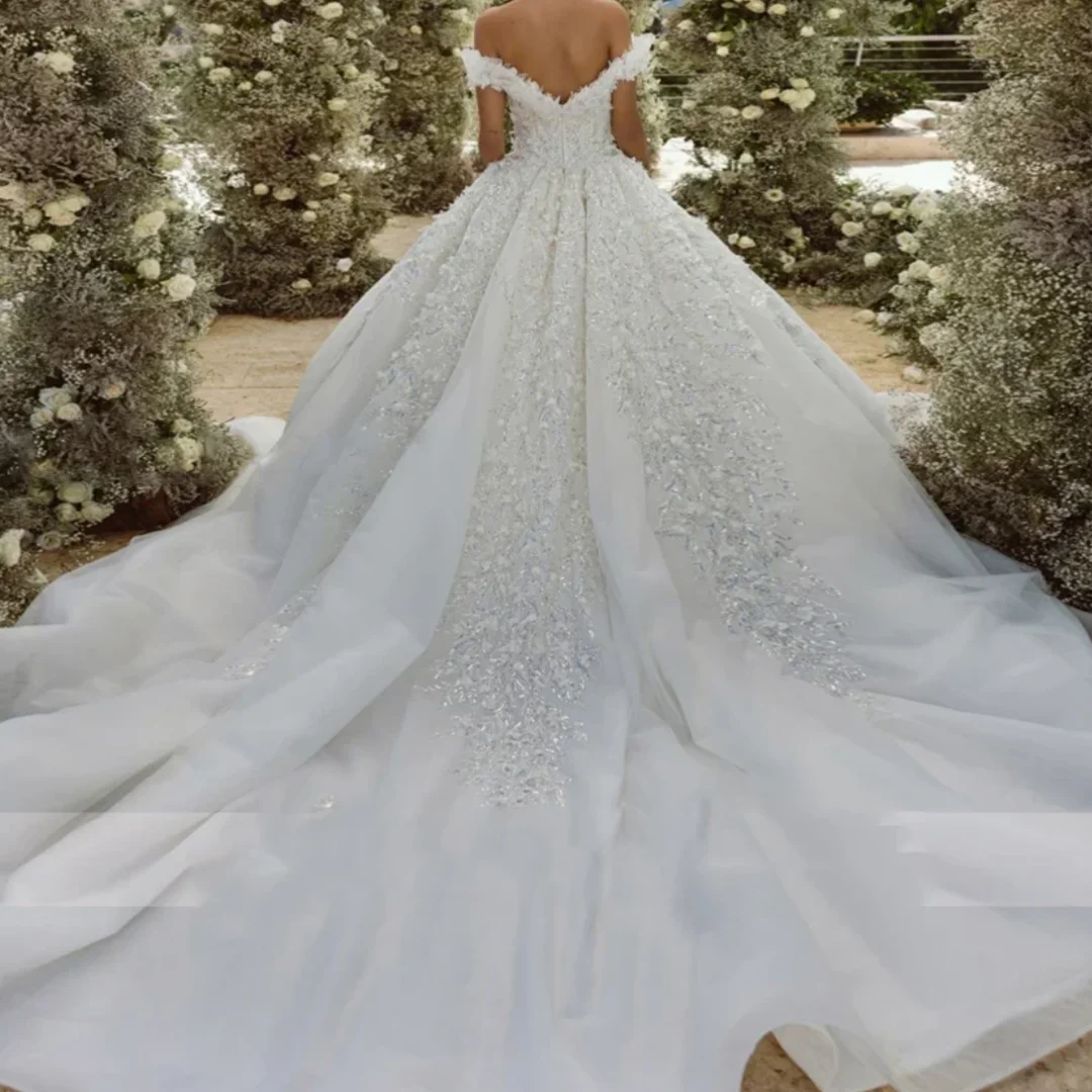 فاخر بلا أكمام قارب الرقبة العروس زيبر فستان الزفاف الأورجانزا مع التطريز الترتر الكرة ثوب مخصص