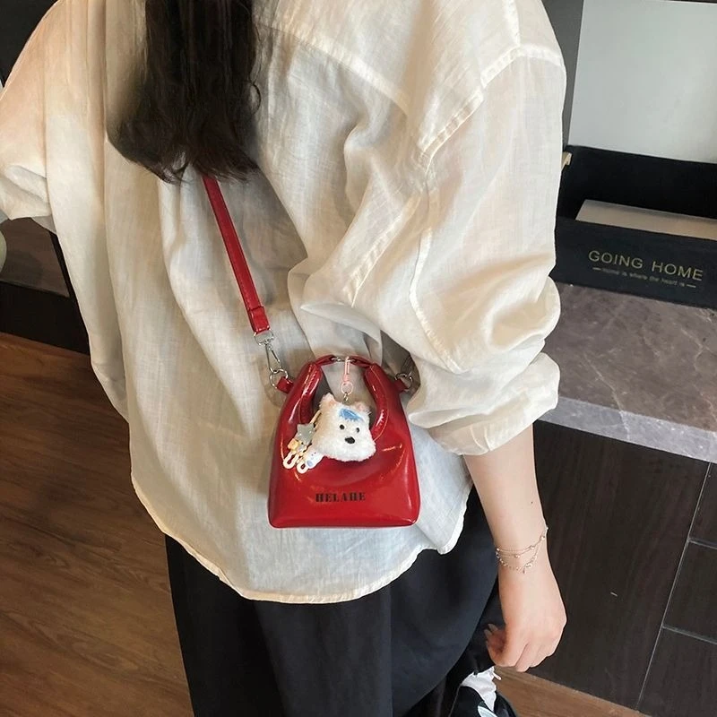 

2025 New Fashion Bucket Zipper Crossbody Bag Ladies Niche Textured Leather Phone Compartment Bags Multi Functional Carry Bag
