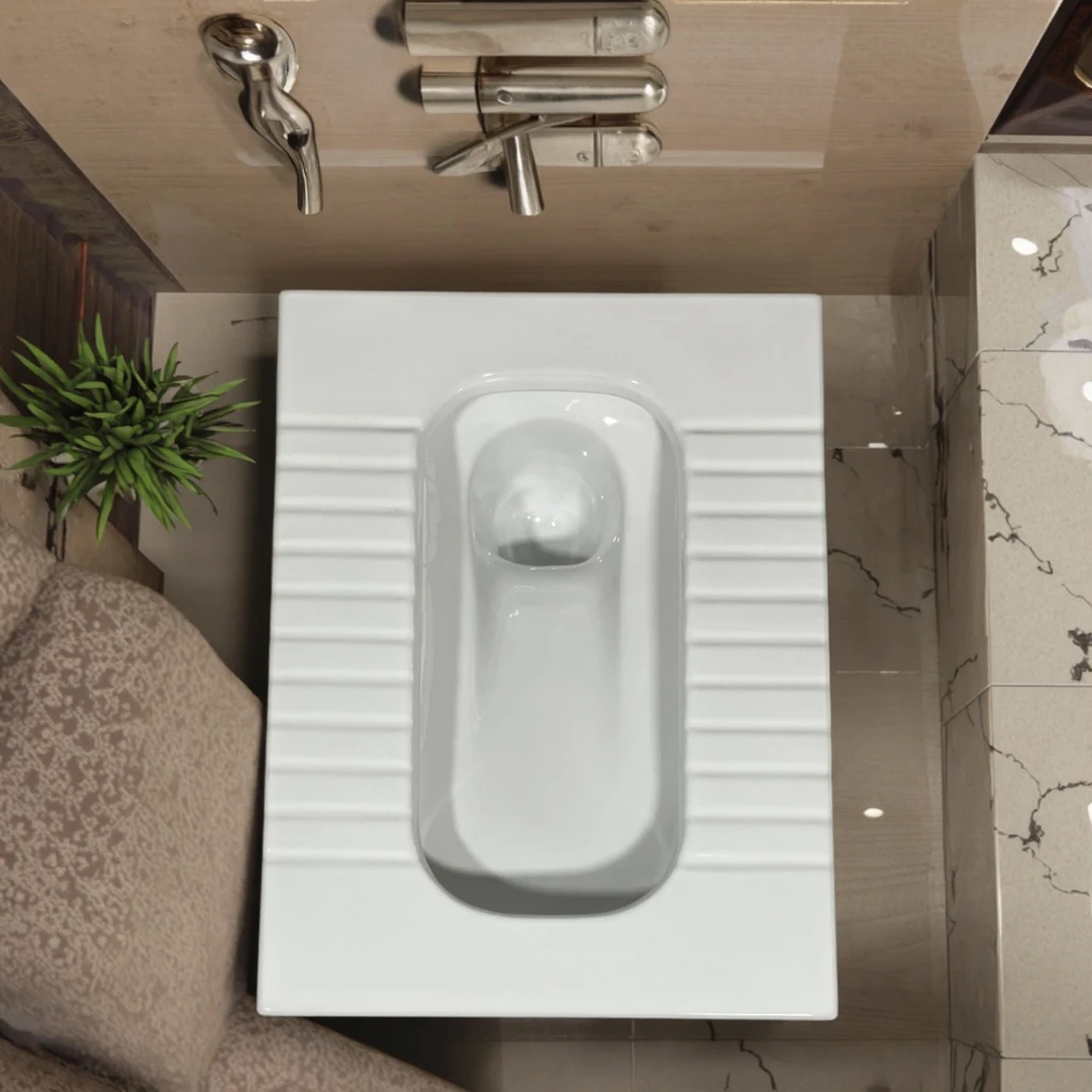 The hotel bathroom is made of modern style high-quality ceramic floor-standing squatting toilet and can be OEM