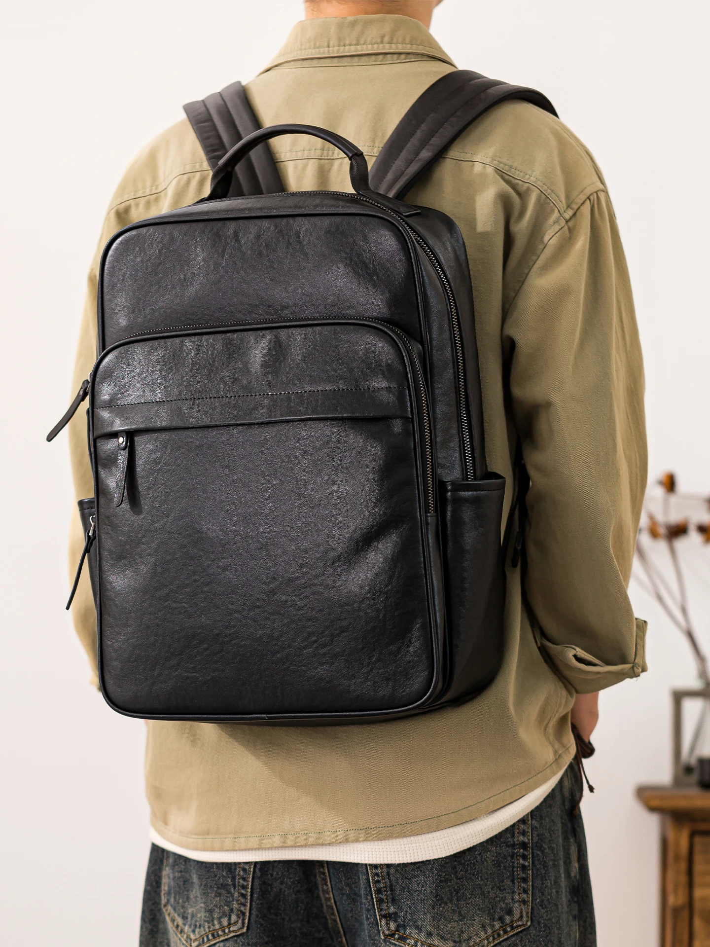 PNDME outdoor travel luxury genuine leather men's laptop backpack simple casual designer handmade cow leather black bookbag