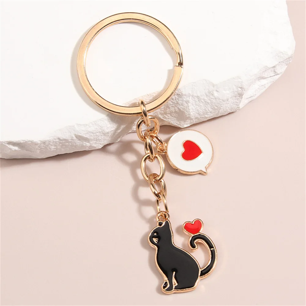 Portachiavi Anime Moon Cats gioielli smaltati al forno coppia in lega di zinco portachiavi accessorio pendente portachiavi regalo per le donne