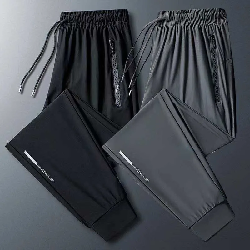

Summer Thin Ice Silk Men Casual Trousers Quick Drying Trend Sweatpants Male Loose Plus Size Taper Leg Fashion Versatile Pants