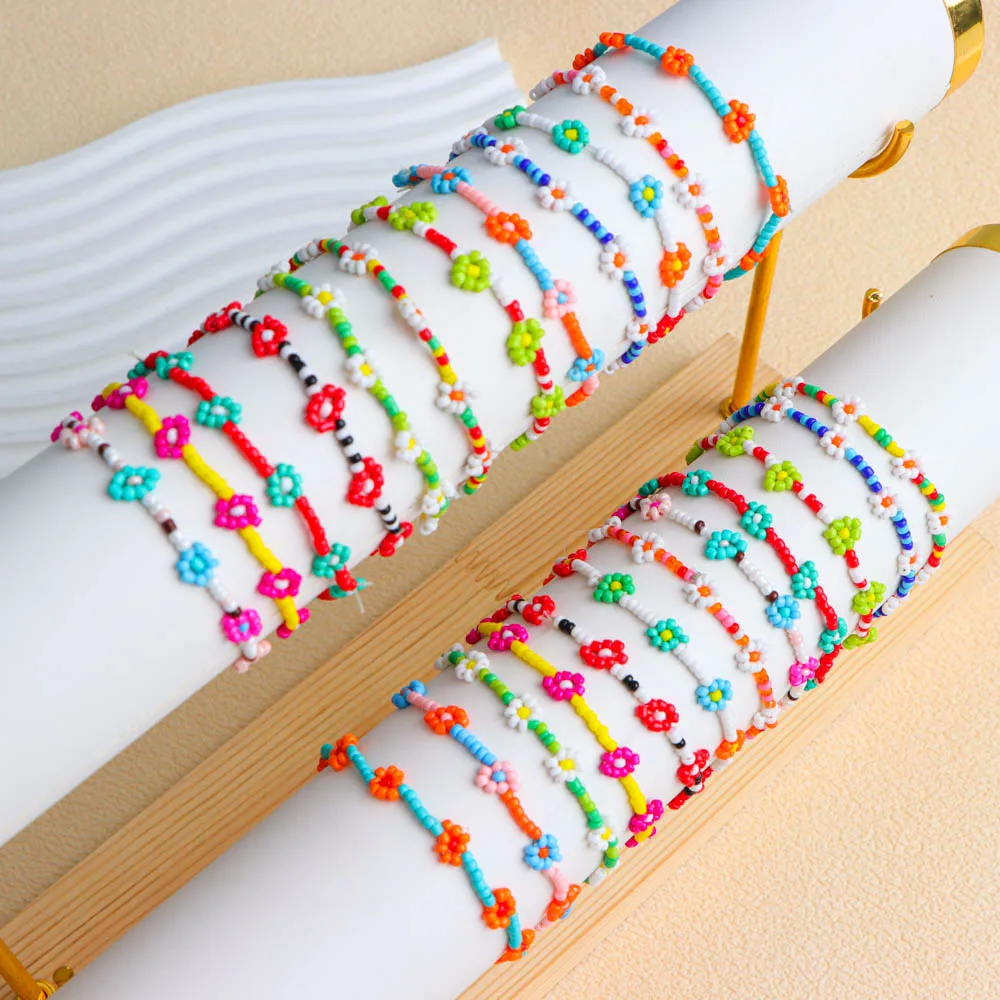 12 unids/lote de pulseras de cuentas de mijo elásticas Multicolor con flores simples para mujer, joyería para fiesta de cumpleaños de buena suerte, regalos de amistad
