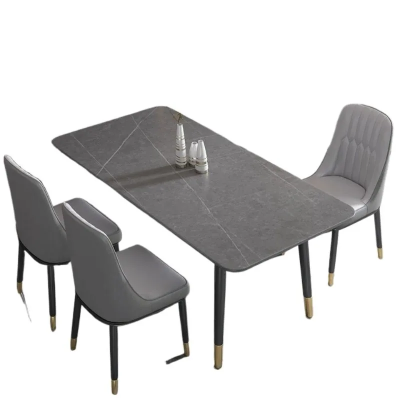 

Italian rock slab dining table and chair combination modern simple rectangular Nordic light luxury dining table