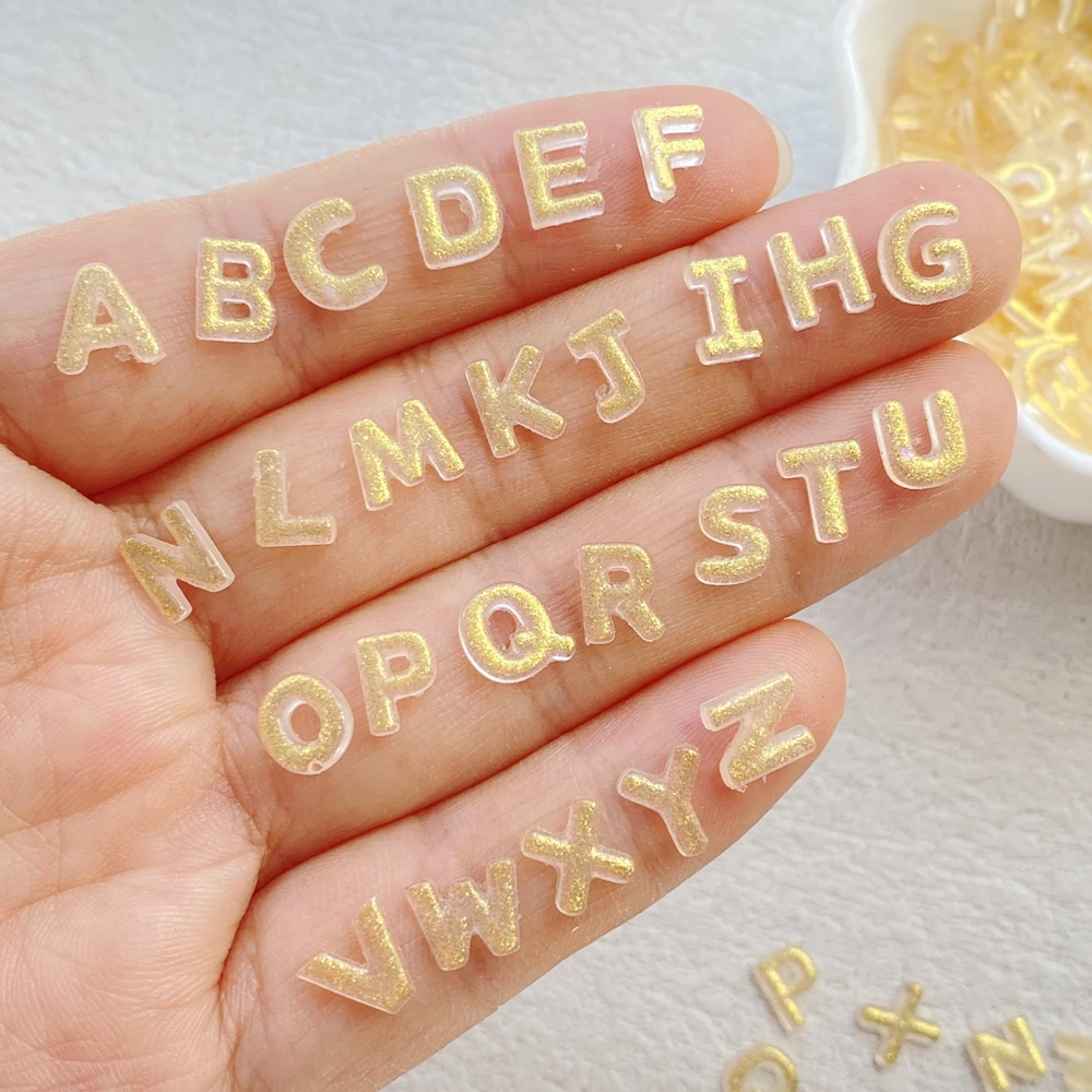 200 pçs resina mista mini dhining 26 letras douradas arte do prego parte traseira plana pedra apliques diy encantos de natal scrapbook decoração artesanato