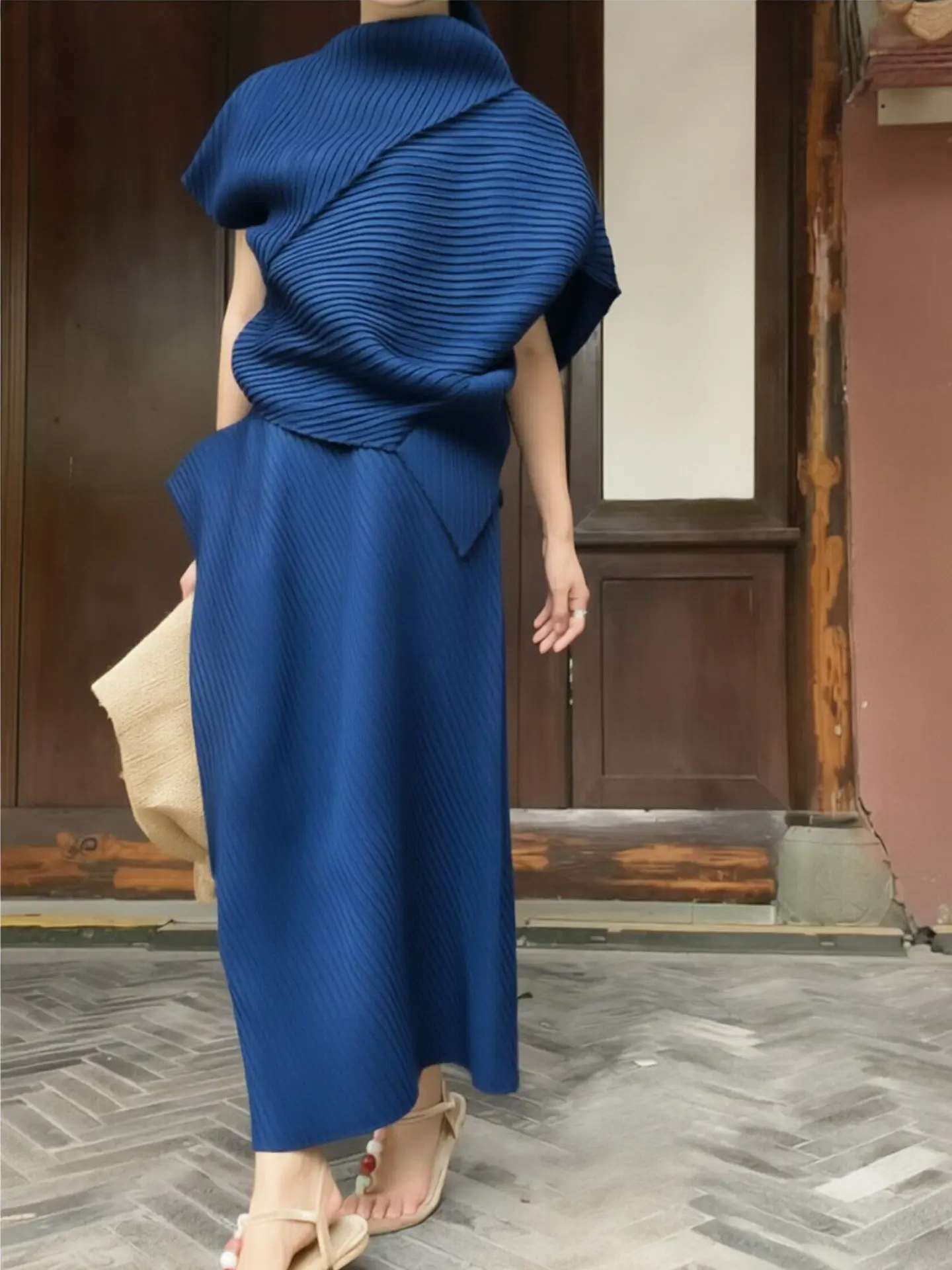 

Three-Body Art Creation Minimalist Asymmetrical Pleated Women's Summer Slim Fit Shirt And Half Skirt Two-Piece Set