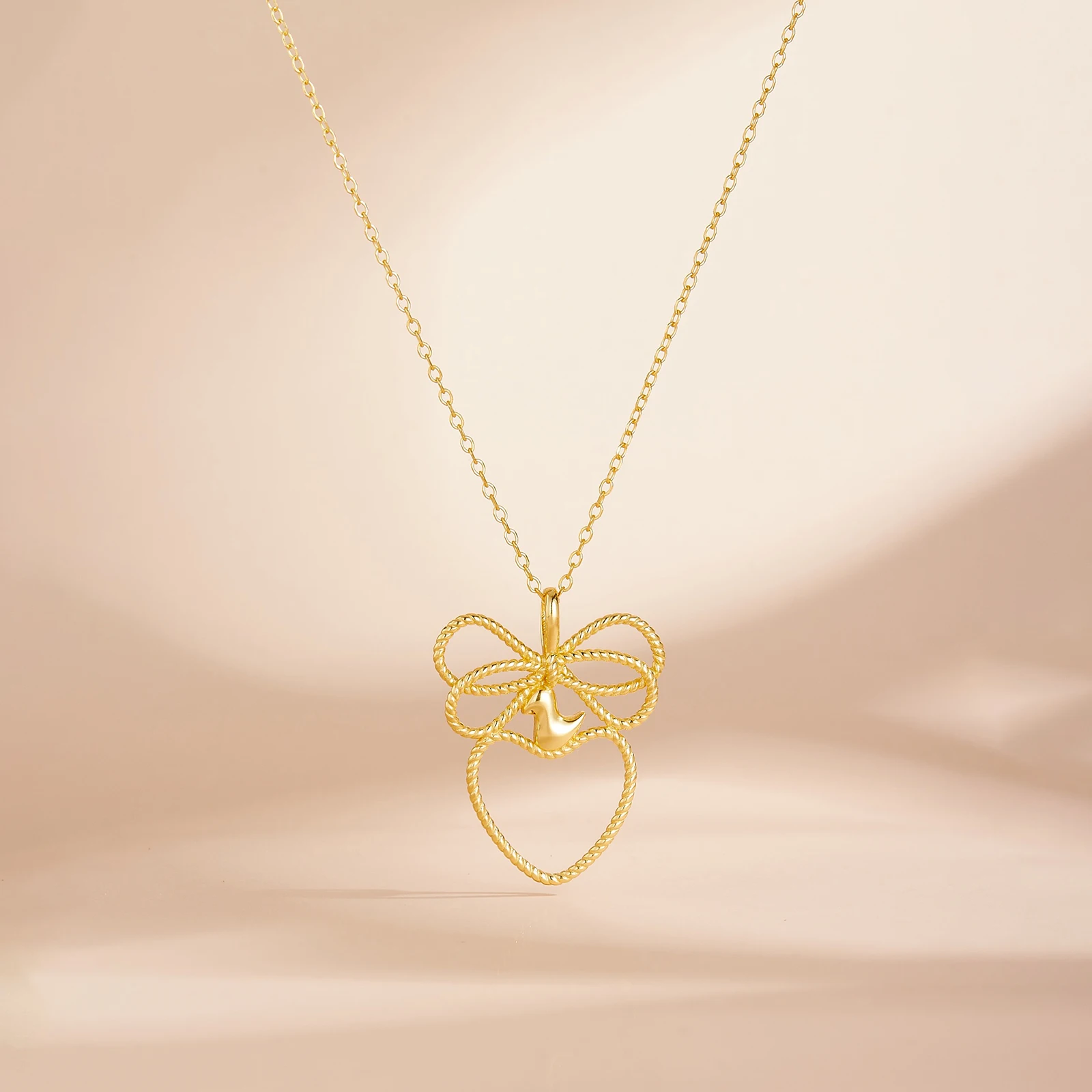 ANDYWEN 925 Sterling Silver Twisted Texture Bow & Hollow Heart Long Necklace 2026 Women Birthday Anniversary Trendy Jewelry Gift