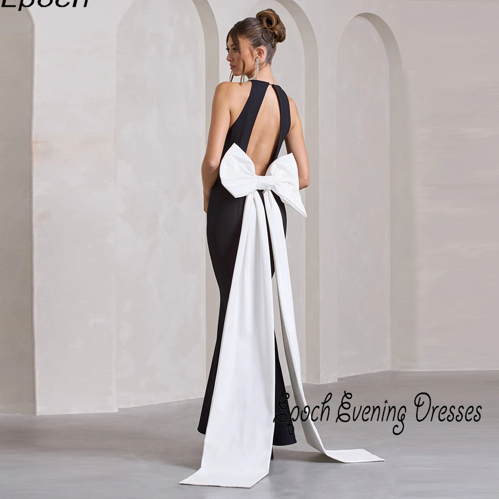 Vestido de noche de época, vestido de fiesta de cóctel de sirena elegante, vestido largo negro con espalda abierta y lazo blanco de gran tamaño