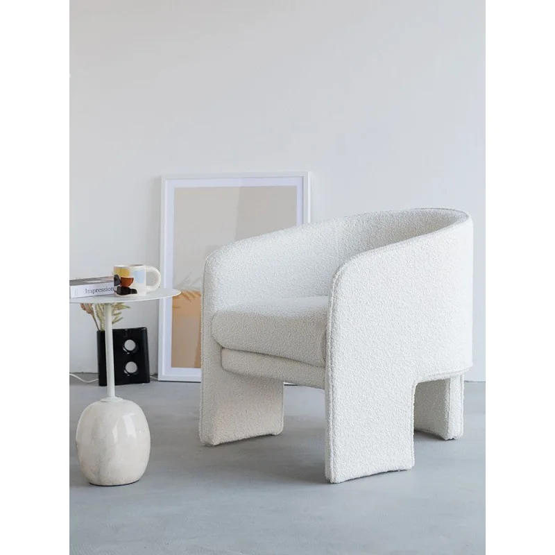 

Italian leisure chair wabi-sabi wind Danish designer furniture triangular chair clothing store photo leisure