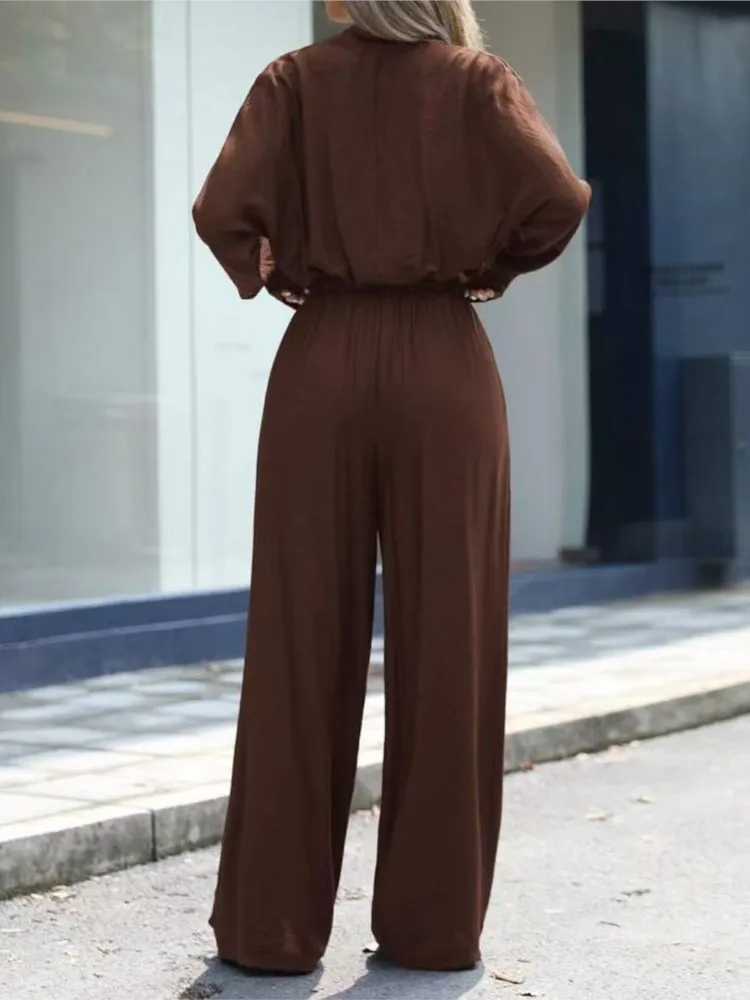 Abito da donna alla moda da strada elegante set da due pezzi sexy scollo a V manica lunga top corto pantaloni a gamba larga set abiti casual da donna primaverili