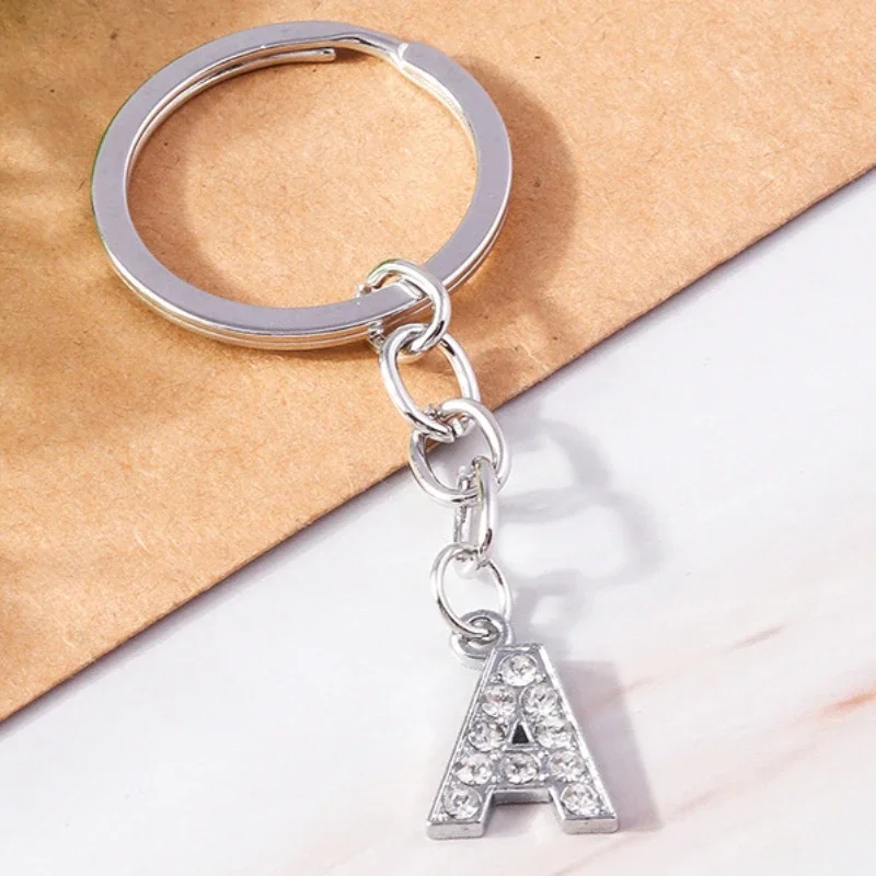 

Fashion Charme A-Z English Letters Keychain Silver Alloy Car Bag Clip Crystal Cursive Alphabet 26 Initials Name Jewelry Keyring