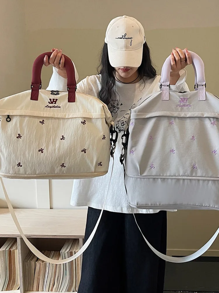 nouveau-sac-de-voyage-portable-leger-grande-capacite-2026-sac-de-livraison-extensible-pour-le-sport-et-le-rangement-sac-de-voyage-tendance-pour-femme