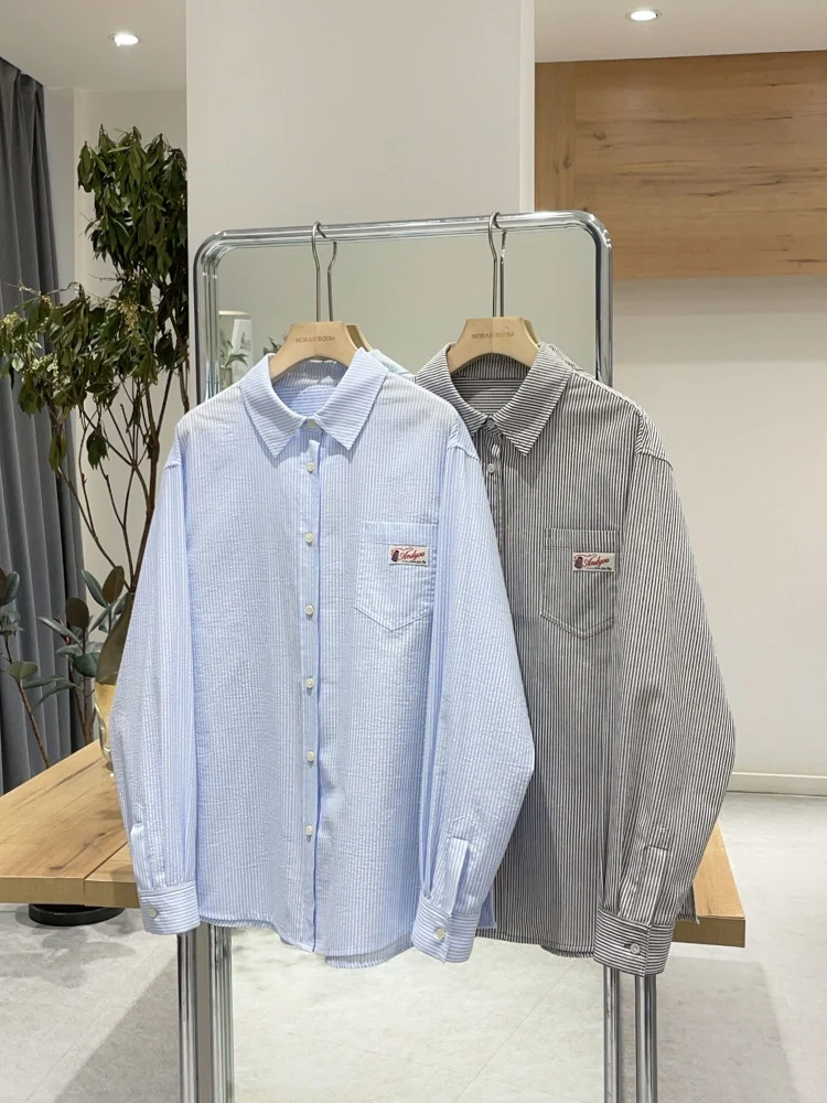 Nolara ربيع 2025 جديد فضفاض الملمس مخطط طويل Sve irt المرأة عادية Sle القطن الخالص مستقيم قطع طوق زر