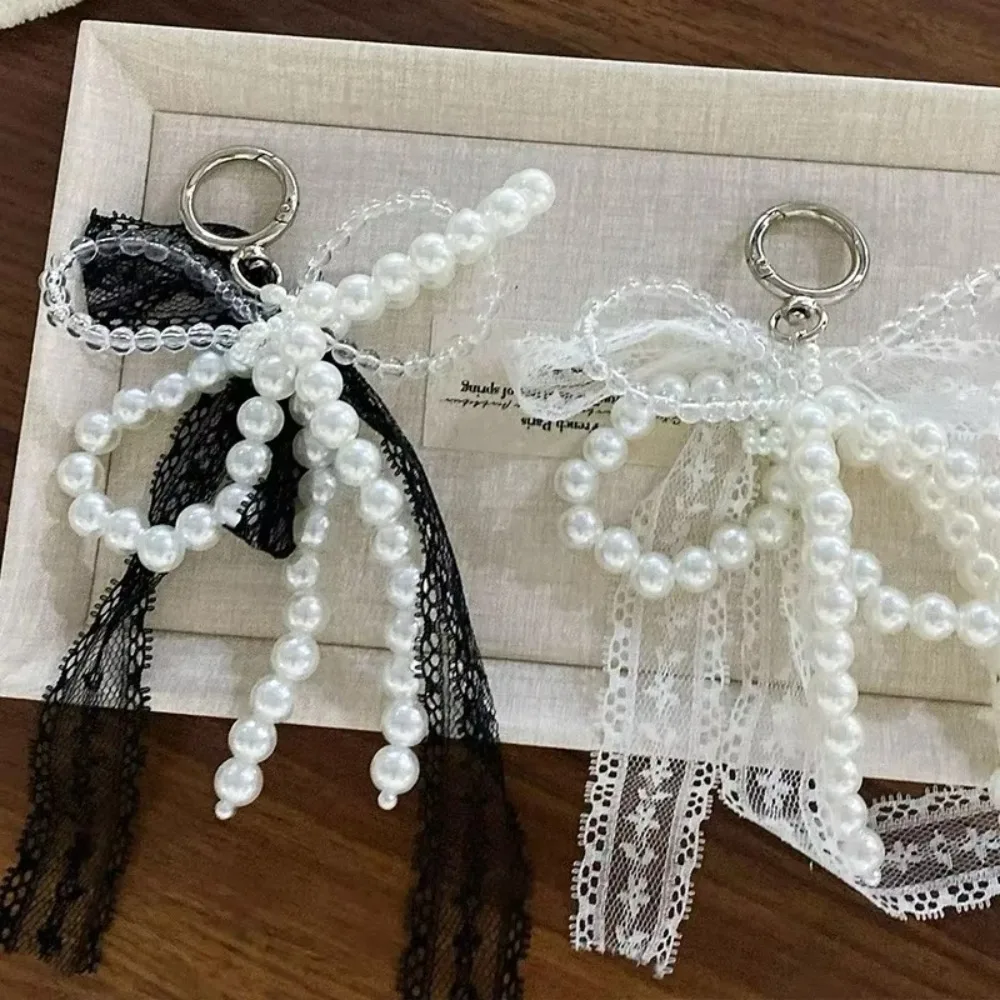 Llavero de encaje coreano con lazo, colgante de bolso blanco/negro, colgante con cuentas de perlas, accesorio de paquete