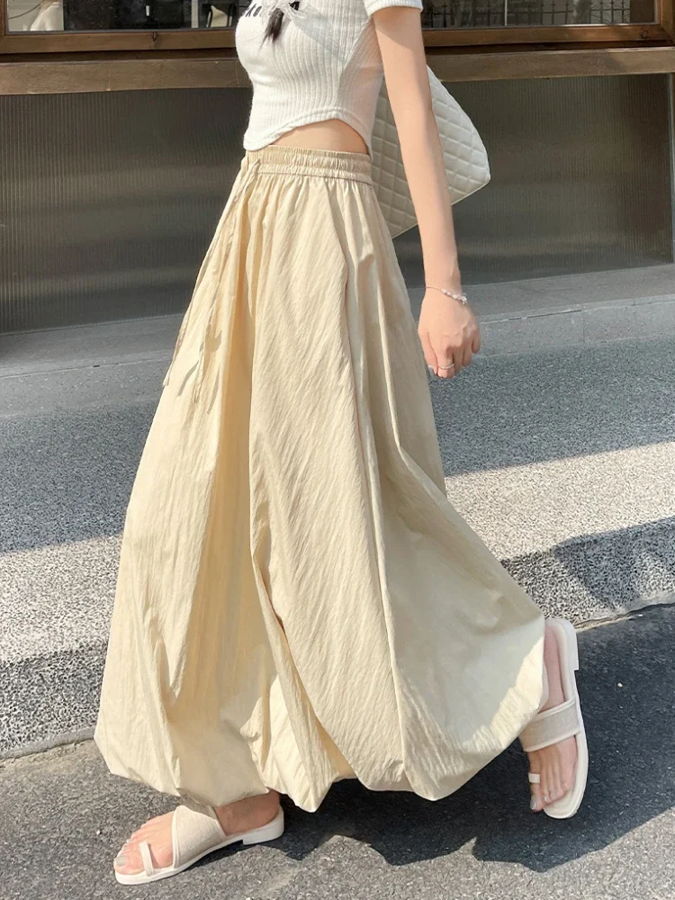 กระโปรงทรงเอไลน์ลายดอกไม้หวานๆ เอวยางยืดสูง รุ่นใหม่สำหรับฤดูร้อน กระโปรงยาวเรียบง่าย สไตล์อเนกประสงค์ ทรงกระโปรงทรงโคมไฟ