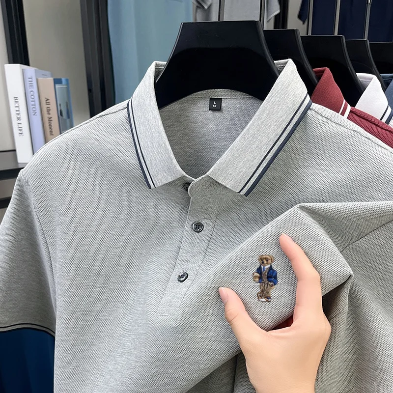 100% Reine Baumwolle 2026 Neuer Sommer Trendiger Bärenmuster-Polo-Shirt Business Pendler-Linie Revers-T-Shirt Komfort Herren Kurzarm-Oberteil