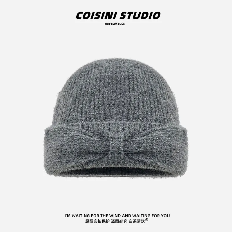 Koreanischer Stil Herbst- und Winter-Strickmütze mit einfacher Schleife für Damen, warme Ohrenschutz-Beanie-Mütze für Herbst und Winter. – Detail 8