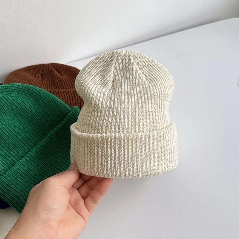 Children\'s wool cap spring and autumn models knitted caps boys and girls warm fashion solid color ear protection cap baby winter