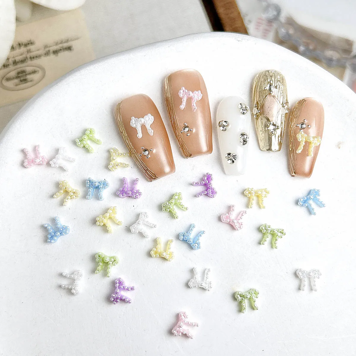 100 pièces innovant simulé perle arc résine ongles breloques créatif minimaliste coloré nœuds papillon Nail Art décorations pour ongles à faire soi-même