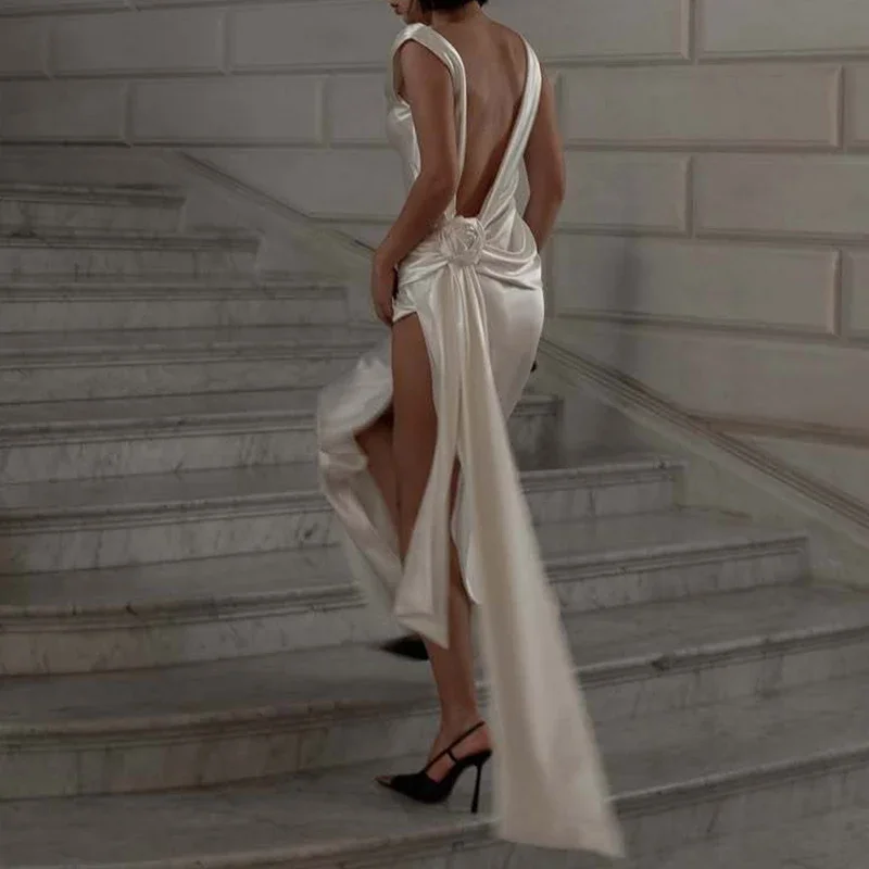 Elegancka sukienka wieczorowa damska z satyny, bez rękawów, z dekoltem w serek, seksowna, z rozcięciem, ażurowa, gładka, modna, z wysokim stanem, drapowana, długa.