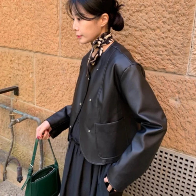 Women's Chic Loose Fit Faionable PU Leather Jaet Asymmetrical Slant Button Design Korean Sle Long Sve Biker Coat