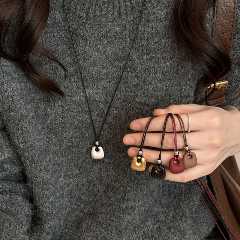 Black Cord Long Necklace Brushed Small Bag Pendant Unique Designer Sweater Chain Versatile Daily Wear Jewelry for Women Girls